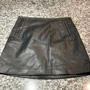 Black leather mini skirt